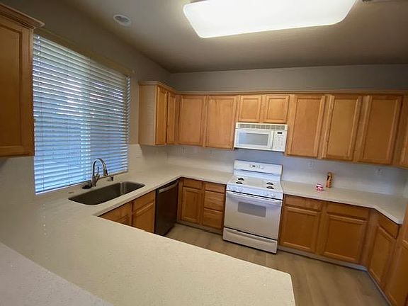 Newly installed quartz counter top and sink.