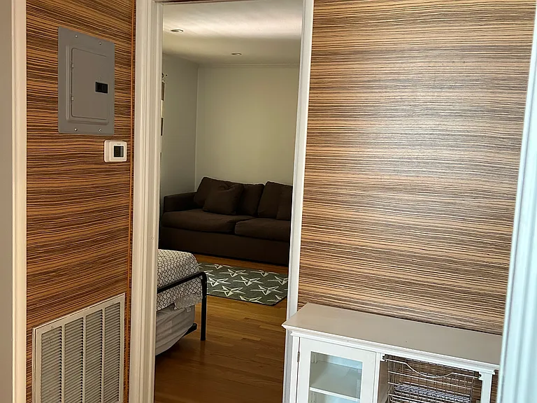 Looking into second bedroom from hallway.