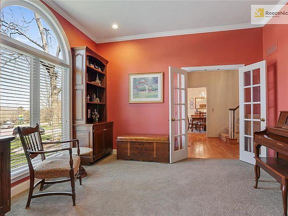 Office with built ins and French Doors for privacy