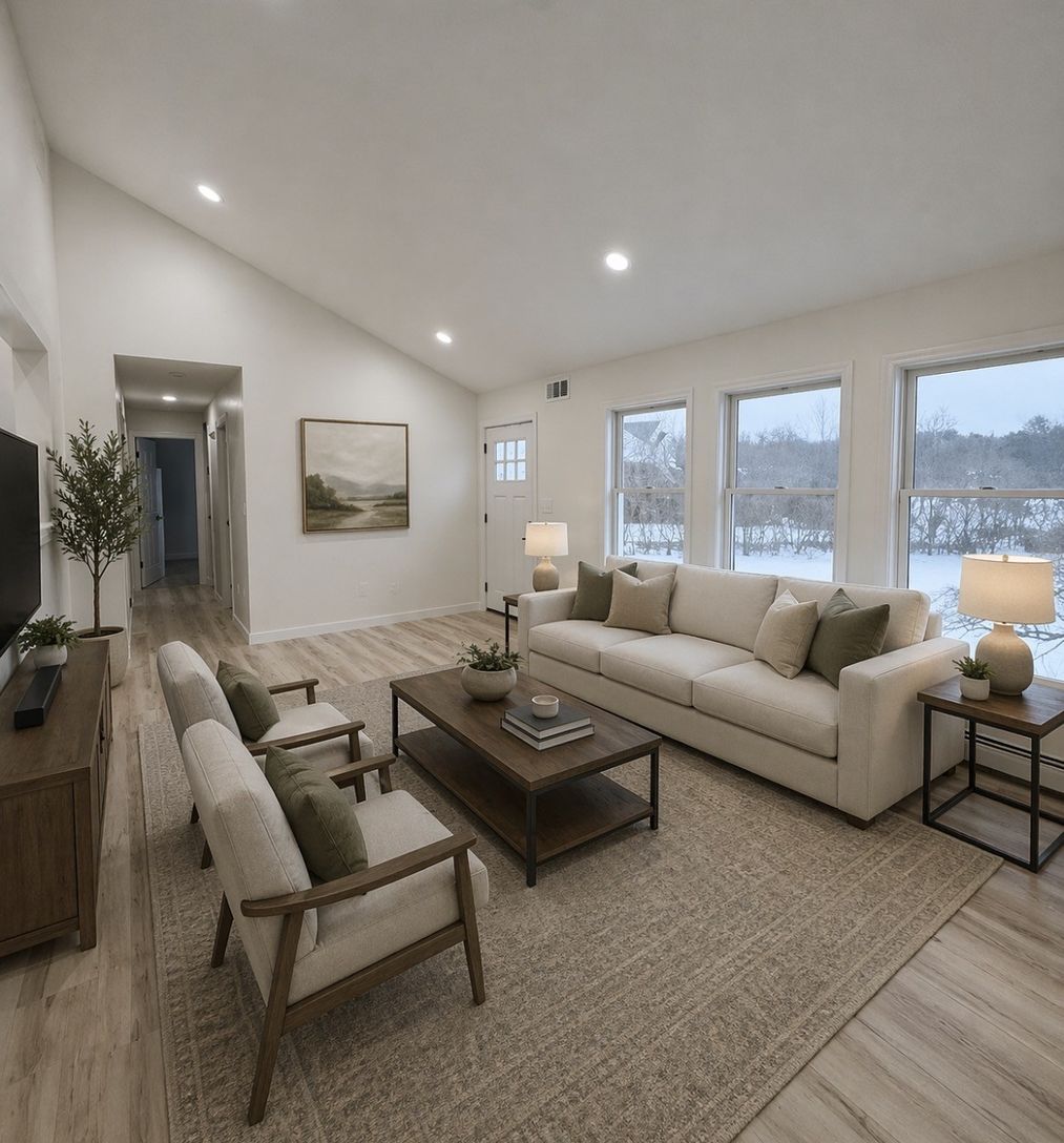  Living Rm with cathedral ceilings, recessed lighting and oversized Andersen windows