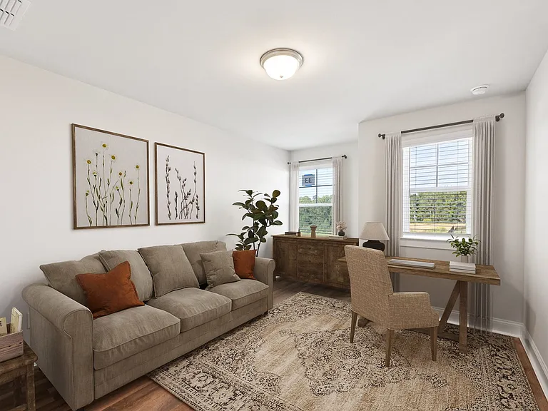 View of the living room area featuring an open concept.