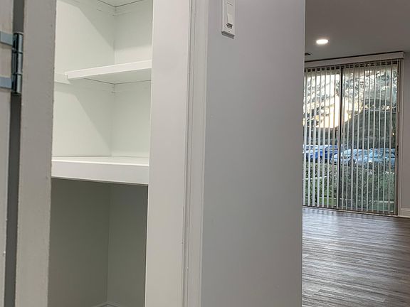 Folding and storage area in laundry room.