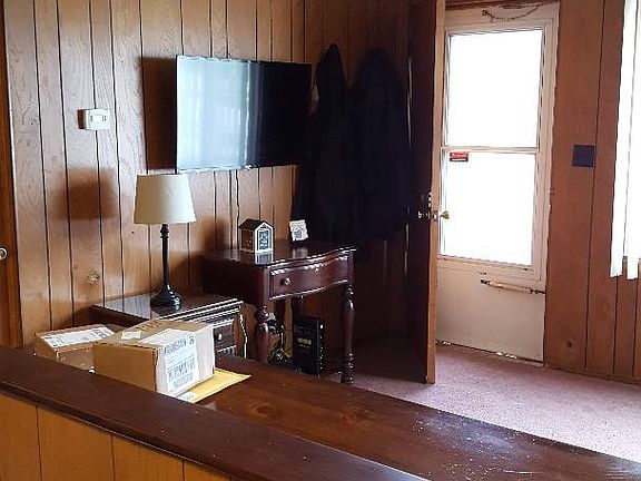 View of entrance and living room from kitchen area.