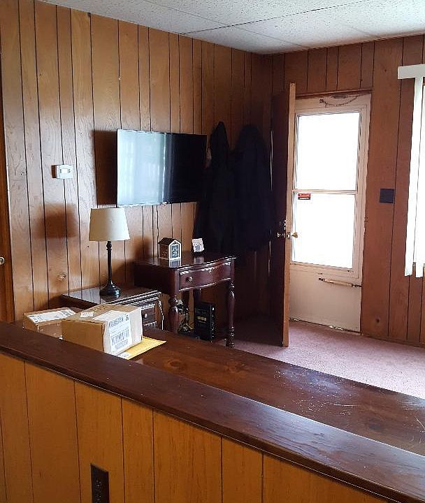 View of entrance and living room from kitchen area.