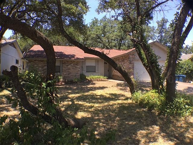 1st image of 10008 Woodland Village Dr