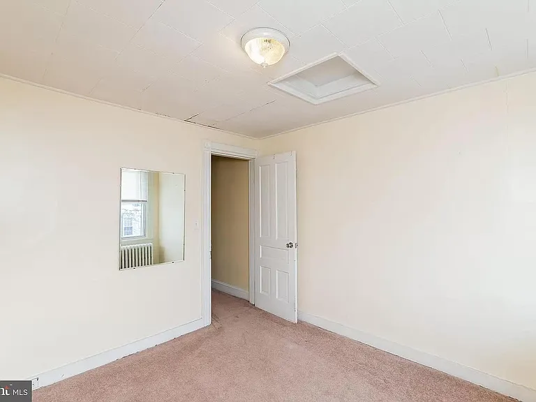 3rd bedroom, smallest, walls painted light blue