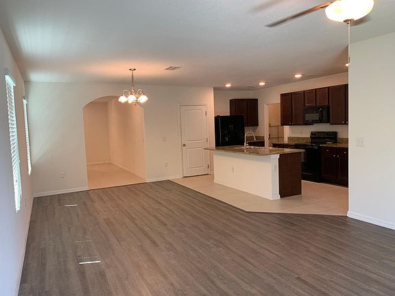 foyer, family room, dining, kitchen area