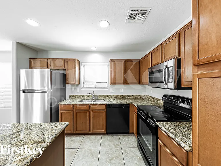 7572 W Charter Oak Rd — Photo 8