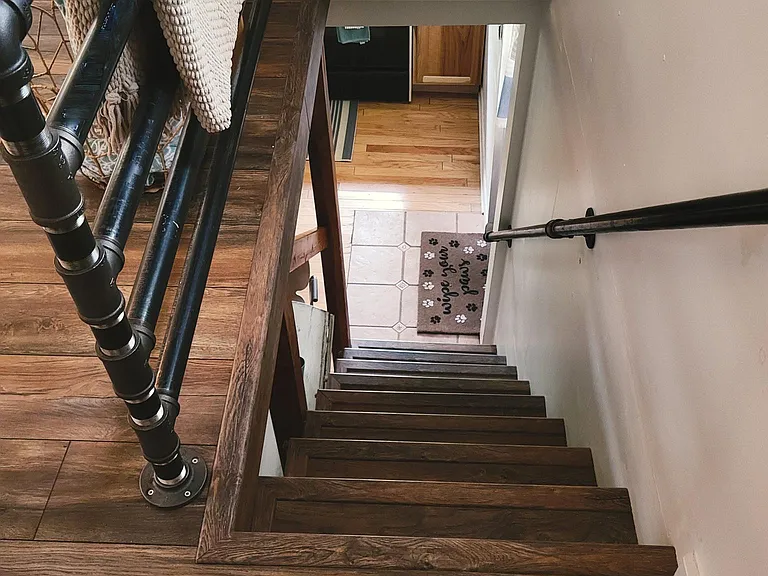 Stairs from living room to kitchen
