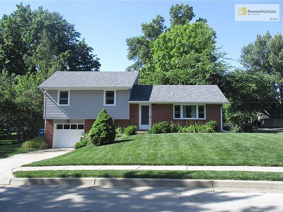 Charming brick and new siding exterior with brand new windows. Lush front yard with perennials about to bloom, and an apple tree just to the left of the driveway will bear fruit in coming years. There is a second driveway stubbed in front for more parking
