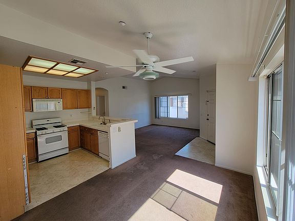 Dining room, kitchen, entry, and living room.