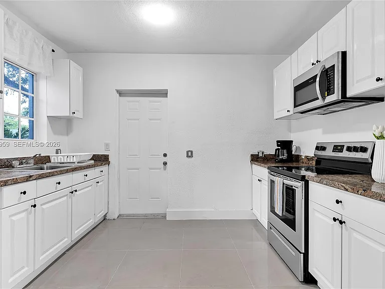 6344 NW Miami Pl — Photo 4