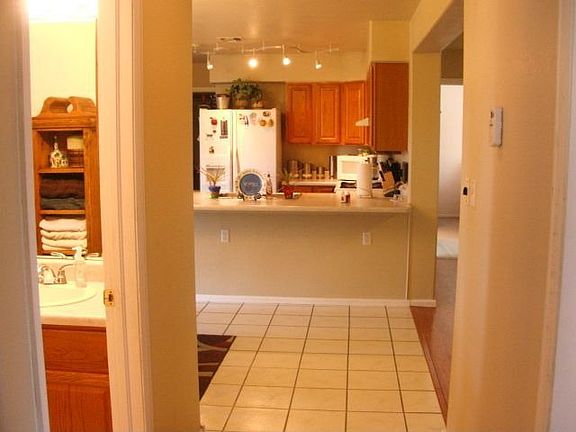 Hallway to Tiled dining rm