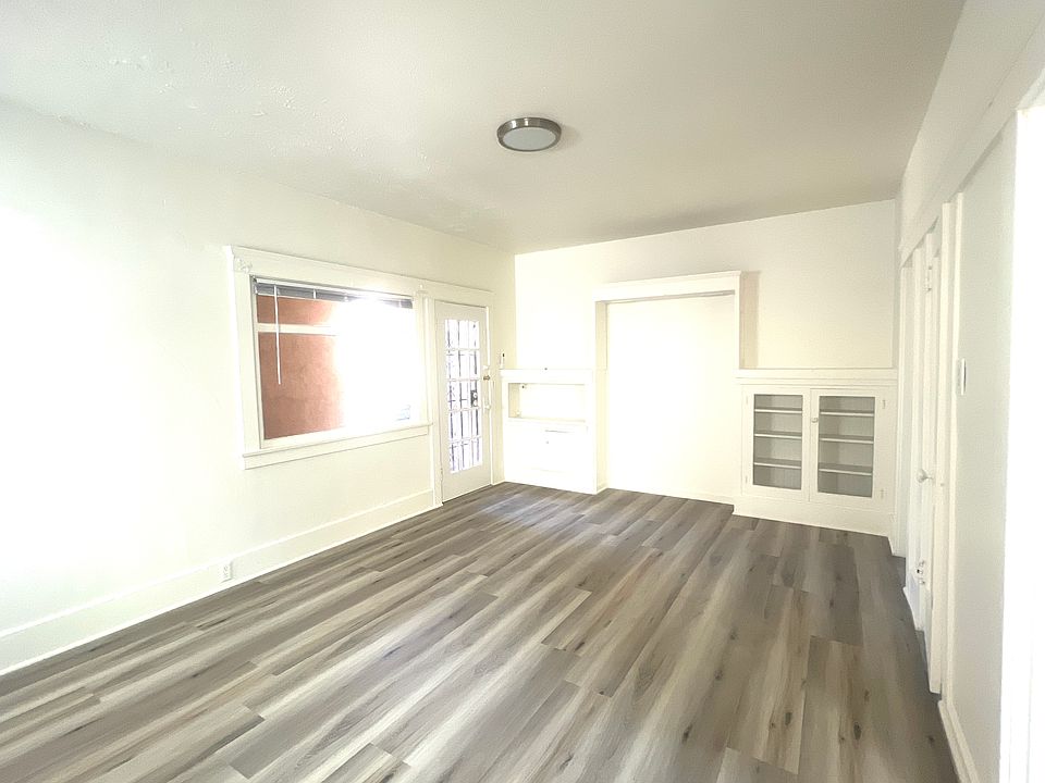 Main room with built ins. Viewed from the kitchen