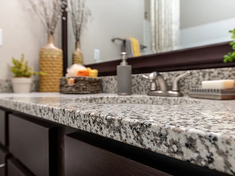 Bright bathroom with granite counters