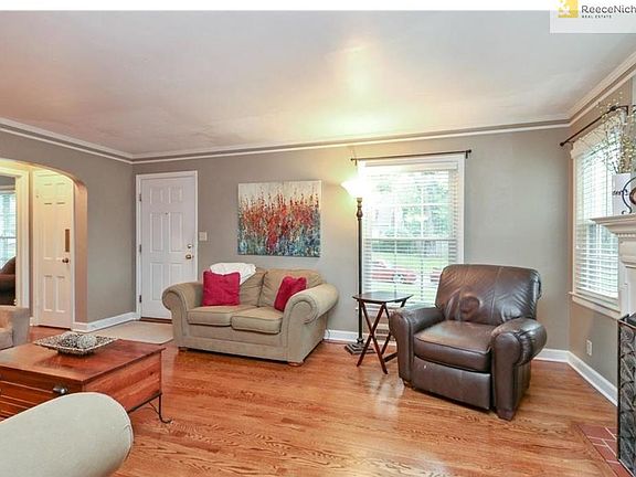 The living room gets great natural light and is open to the formal dining room, for a great flow in to the kitchen
