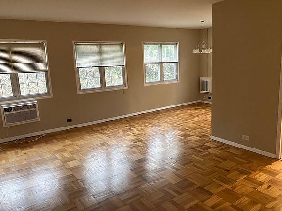 Large combined living room and dining area. Parquet floors throughout. Fresh paint throughout.