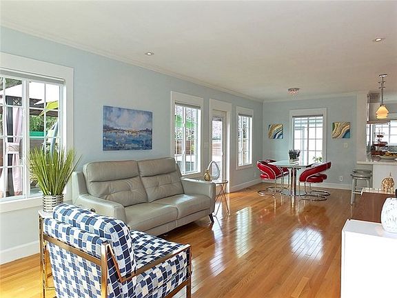 Sunny living room with white oak flooring