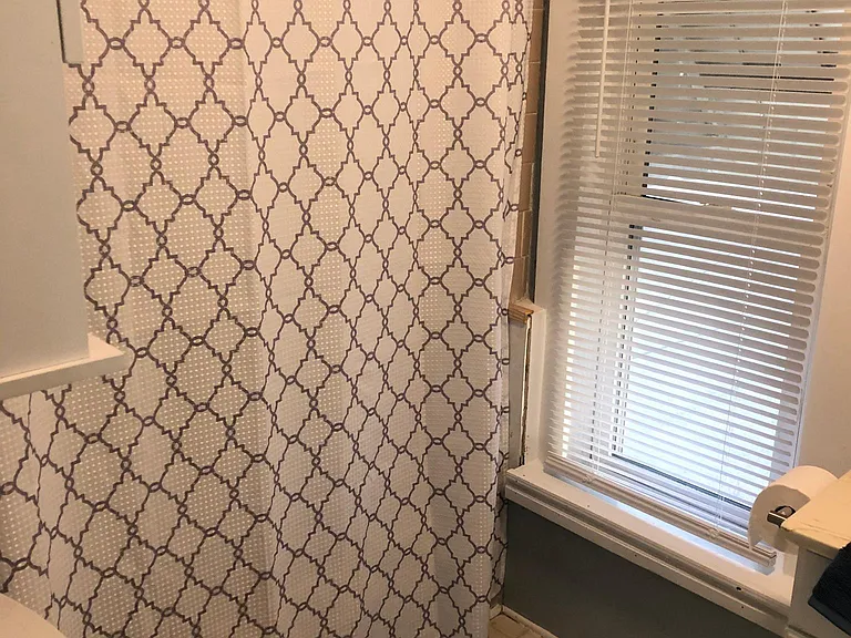 new toilet, cabinet over toilet and medicine cabinet