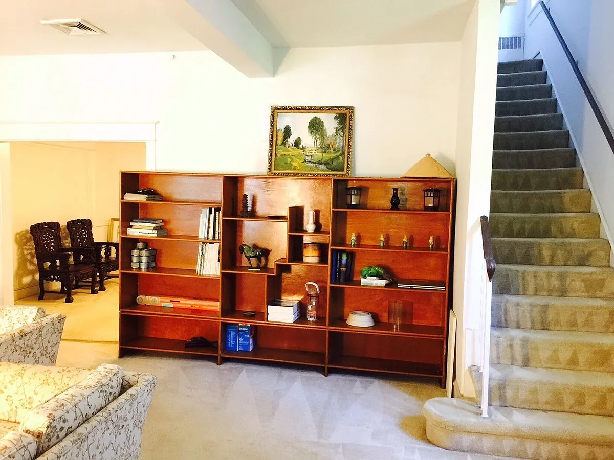 Bookshelf in the main living room - 3706 Massachusetts Ave NW