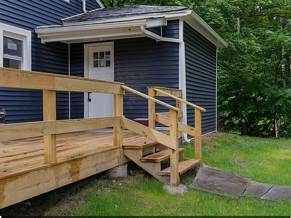 Side entrance with patio