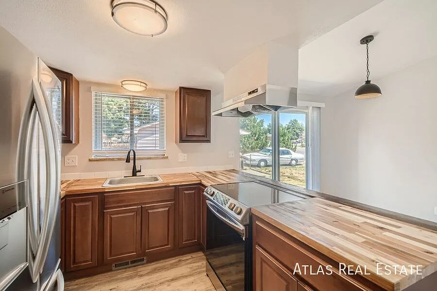 Coming Soon! Spacious 3bd/2ba Aurora Home with A/C and 3-Car Garage — Photo 4