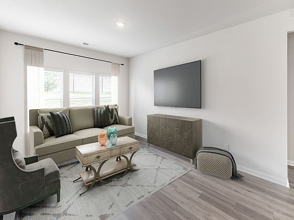 Great Room in the Newport floorplan with the Balanced Dark interior package.