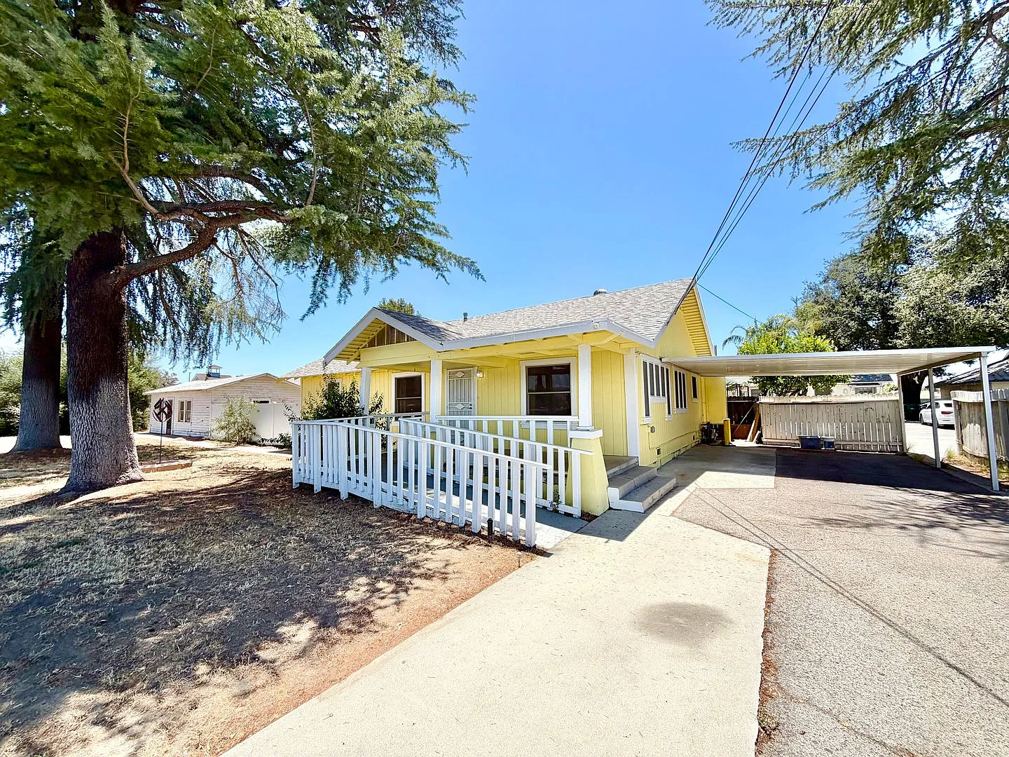 Charming 3 Bedroom Home with Included Landscaping, Spacious Backyard & Carport — Photo 3