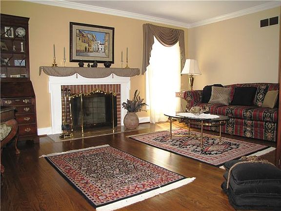 Formal Living Room with Woodburning Fireplace