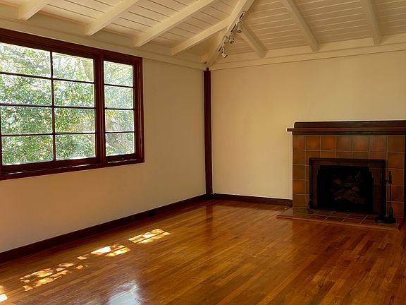 Living Room with wood-burning fireplace.