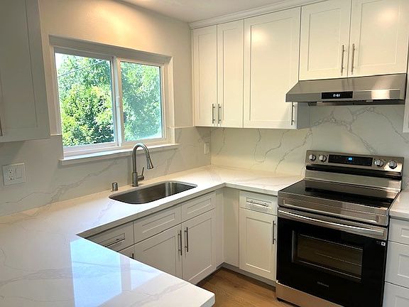 Natural light floods brand new kitchen
