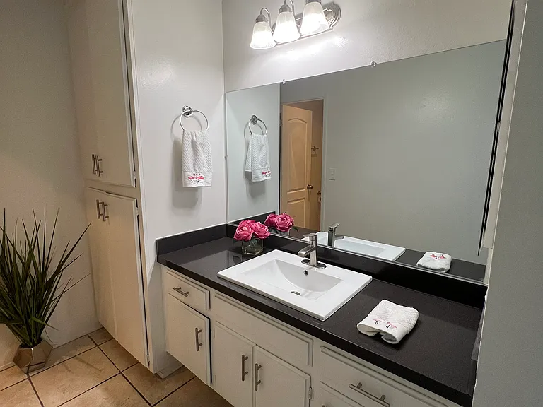 The vanity with granite counter-top