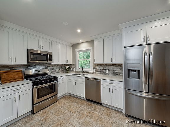 Updated With New Cabinets & Quartz Counters.