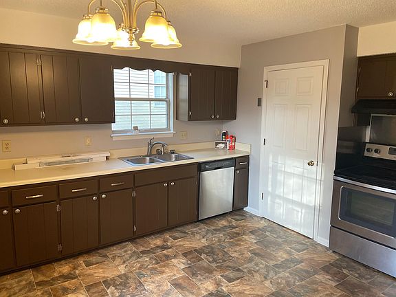 Kitchen utility room behind door