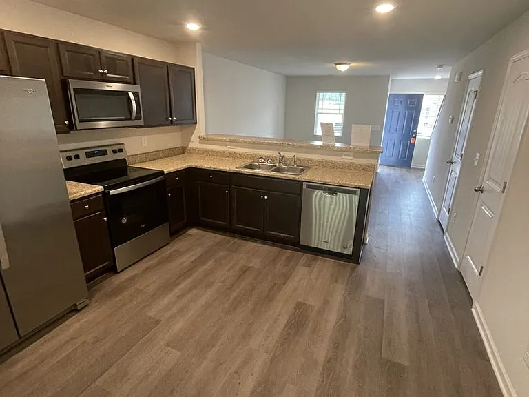 2020 Wiggins Village Dr — Photo 2