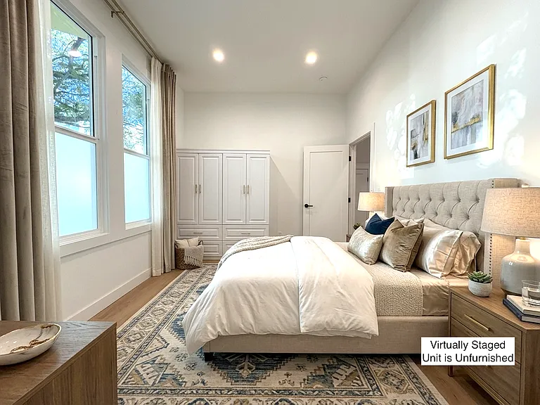 Large bedroom 1 with huge windows (virtually staged)