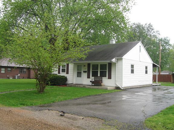 Angle View of front. Paved driveway.