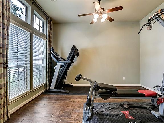 The Formal Living Room is currently being used as an exercise room but could easily be a study/library, music room, school space or whichever works best for this flexible room for your family.