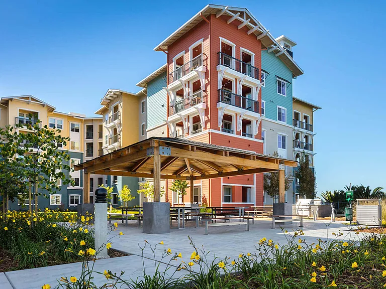 Blu Harbor by Windsor boasts expansive outdoor amenity space, with water views surrounding