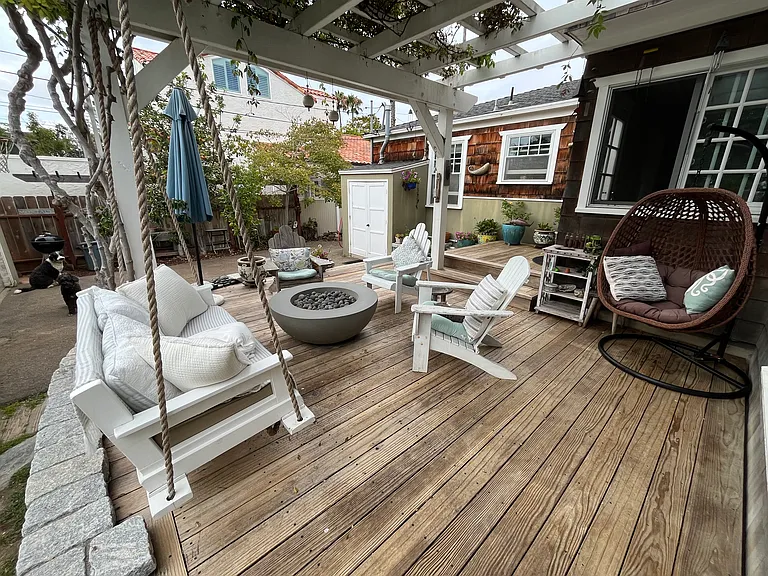 Deck with fire pit just outside dining room and family room.