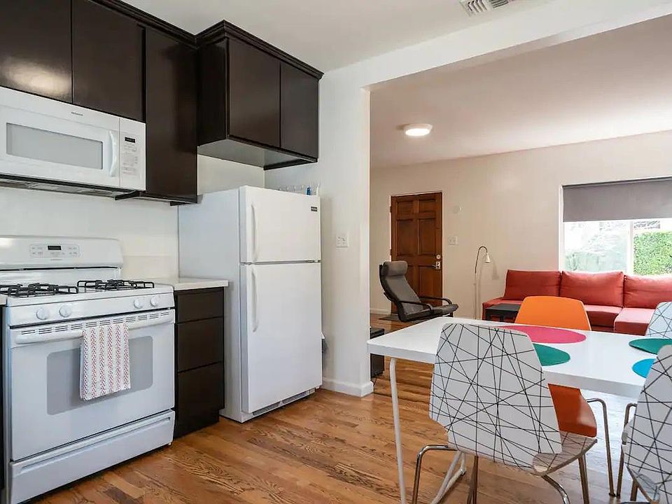 Kitchen with appliances & dining area