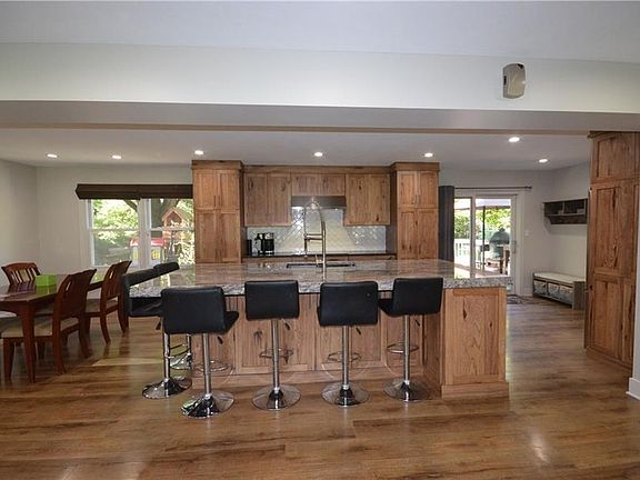 WOW!! Current owners have taken down walls and brought this home into today's open concept floorplan!