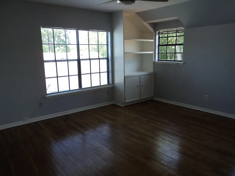 Upstairs master bedroom with built-in.