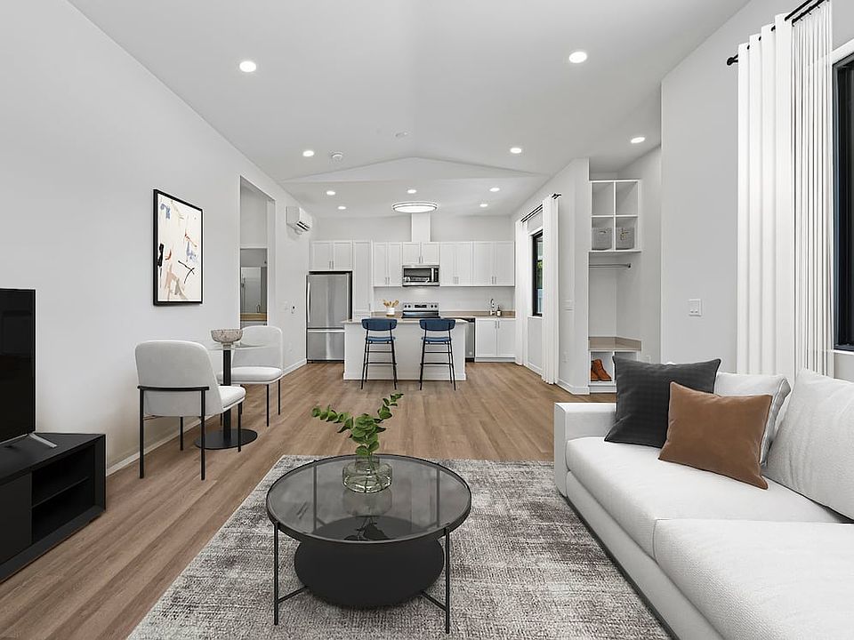 Coming Soon: Renovated Package II dining and living room with hard-surface flooring