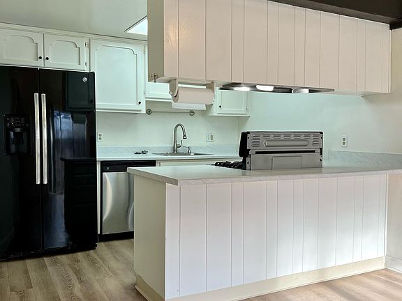 Brand new countertops complimented by modern appliances.