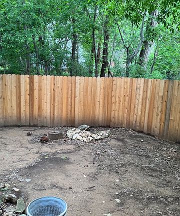 Large fenced in back yard. Perfect for pets and/or garden.