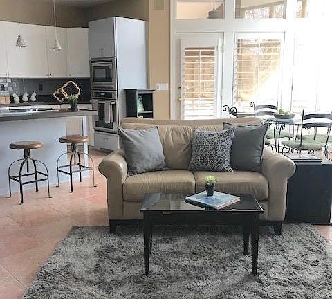 Cozy Hearth Kitchen with Unique Built Ins & See Thru Fireplace