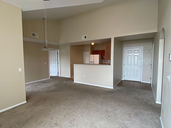 Living room looking into kitchen