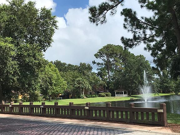 Bridge crossing lake to get to the Townhome