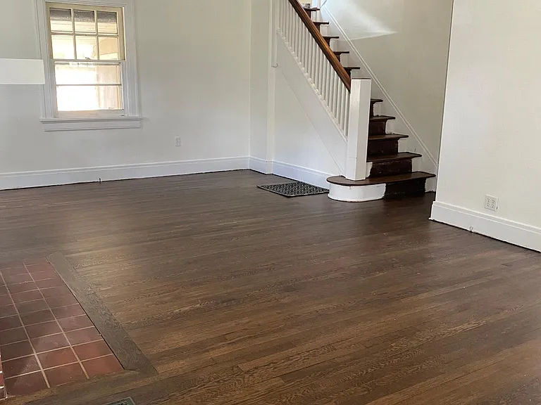 Living room with a view of the staircase